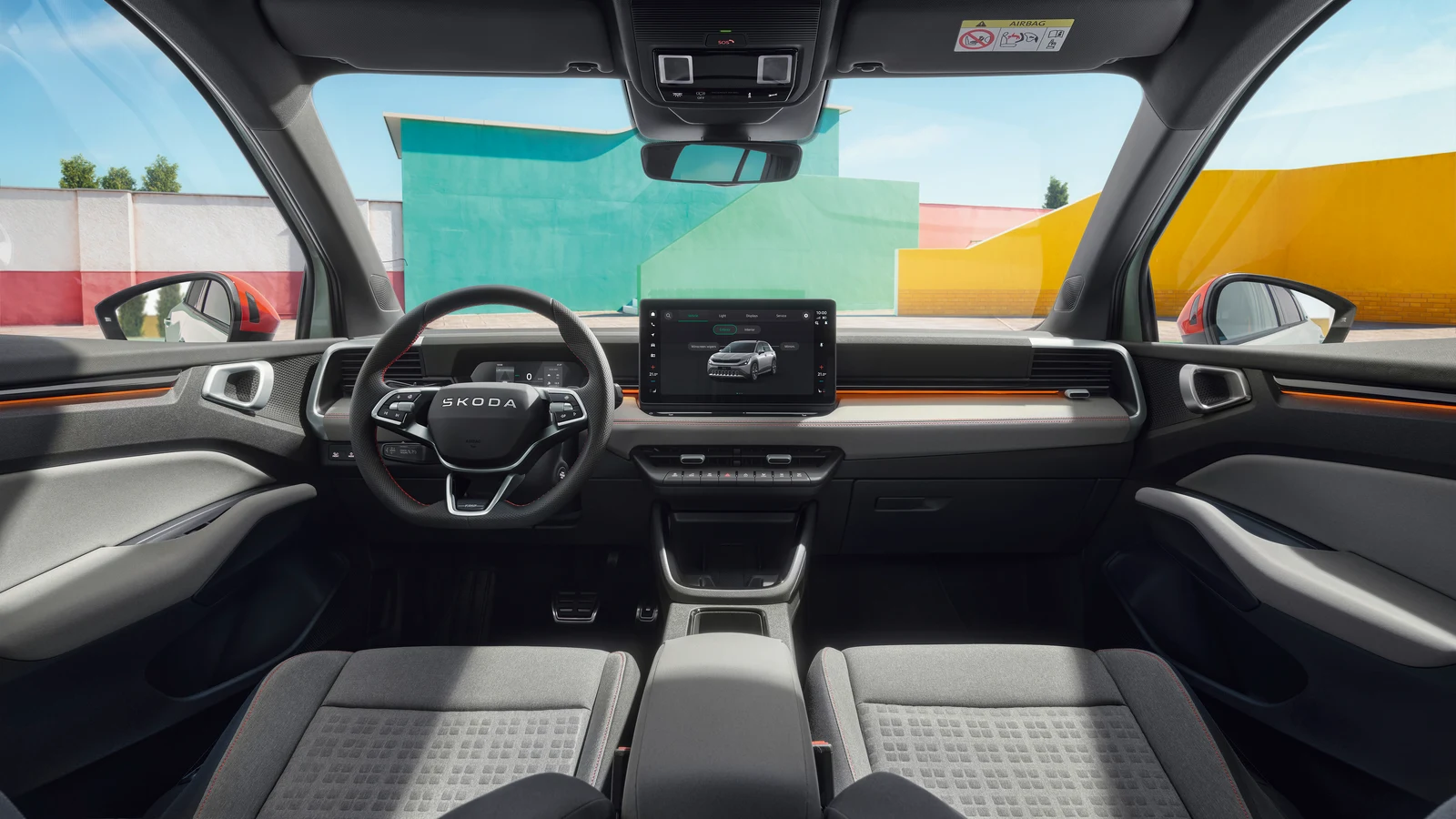 Škoda Epiq Bilder vom Innenraum: Cockpit der First Edition mit oranger Zierlinie und Sportlenkrad