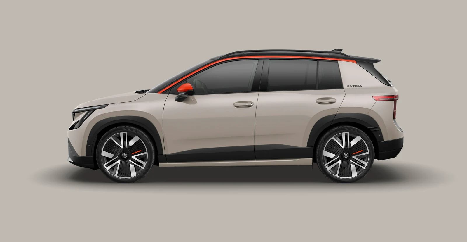 Škoda Epiq First Edition in der Seitenansicht mit orangem Dachbogen und 20-Zoll-Rädern